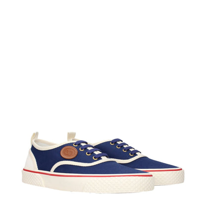 Valentino Garavani Blue Fabric Low Top Sneakers with side and back logo details, perfect for casual wear.
