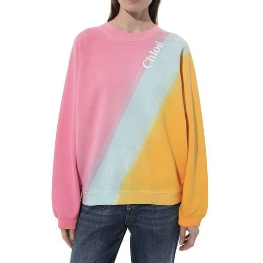 Woman wearing Chloé Chloe’ Sweatshirt, 100% Cotton, long sleeves, round neck, ribbed trims, colorful design, made in China.