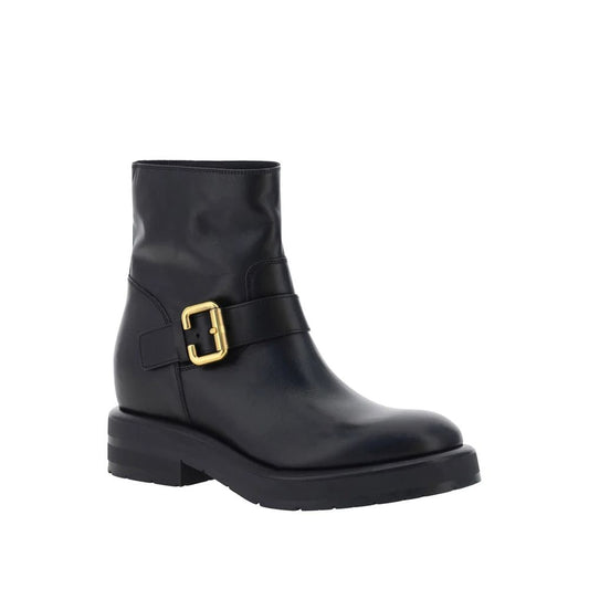 Chloé Coddington Ankle Boots in black calf leather with rubber sole and gold buckle, women's slip-on style, made in Italy.