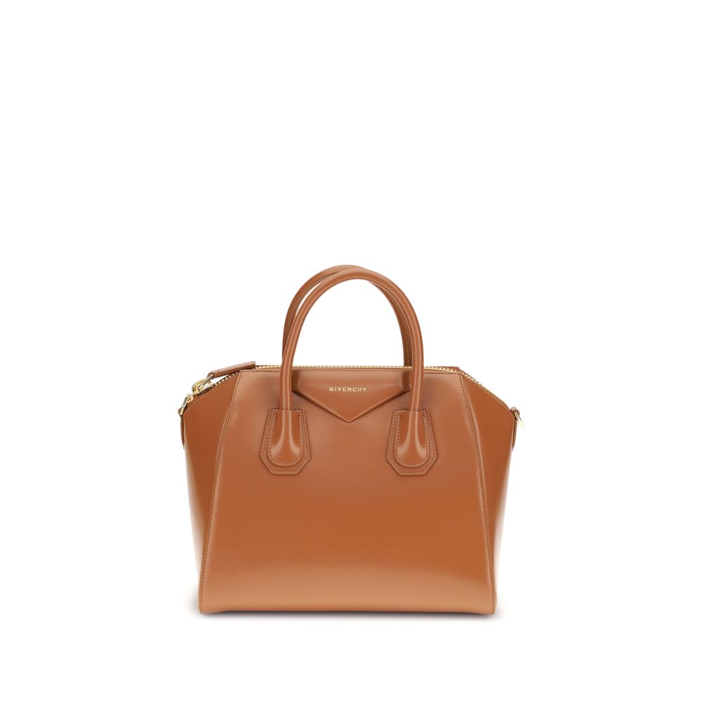 Givenchy Brown Calf Leather Bos Taurus Handbag with glossy finish, featuring round handles, zipper closure, and removable shoulder strap.
