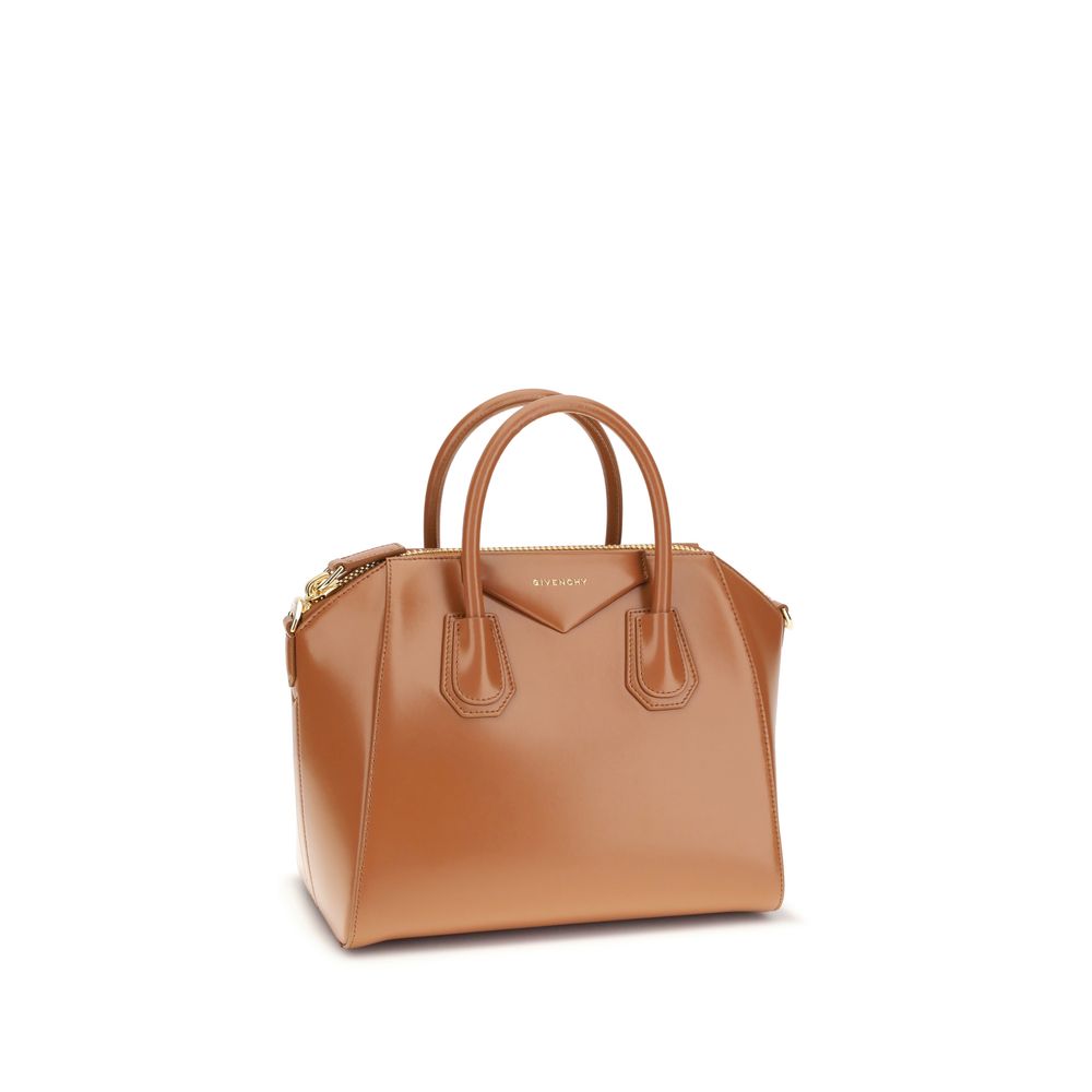 Givenchy Brown Calf Leather Bos Taurus Handbag with glossy finish, round handles, and removable leather shoulder strap.