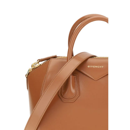 Givenchy Brown Calf Leather Bos Taurus Handbag with glossy finish and logo, features round handles and removable shoulder strap.