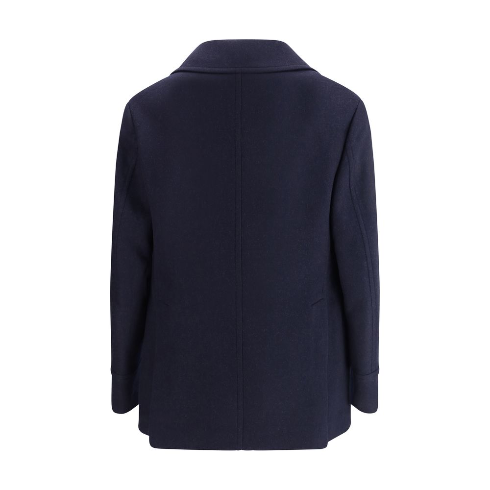 Back view of Brunello Cucinelli Blue Wool Coat showcasing elegant design with lapel collar and vertical pockets.