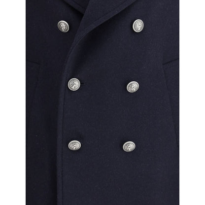 Brunello Cucinelli Blue Wool Coat with metal button closure and classic lapel collar, showcasing elegance and functionality.