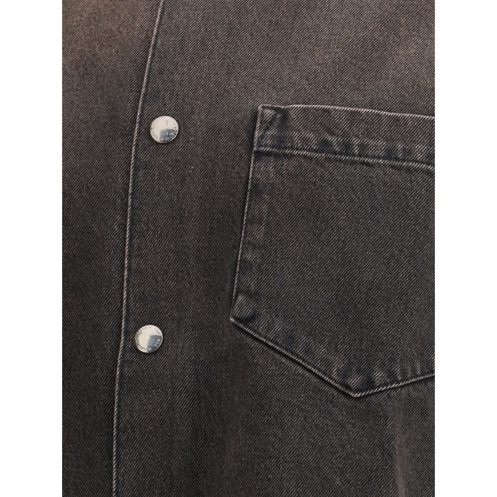 7FOR Black Cotton Denim Jacket showing front button closure and patch pocket detail, made from 100% cotton for a relaxed, edgy style.