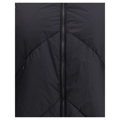 Close-up of Tatras Black Polyamide Shell Jacket showing detailed double-slider zipper and quilted design for warmth and style.
