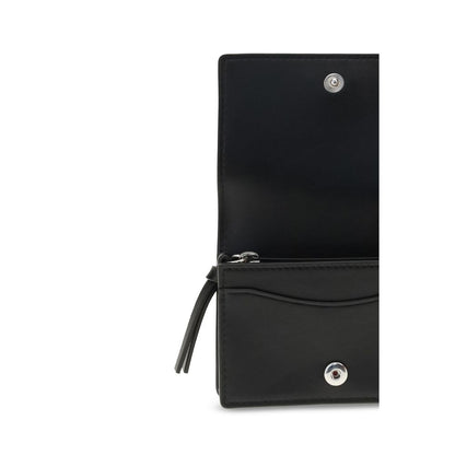 Interior view of Ganni Black Recycled Leather Wallet with compartments, showcasing silver button closures, elegant design, and high-quality finish.