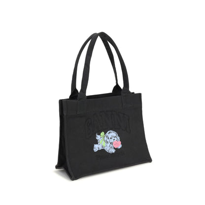 Ganni Black Cotton Shoulder Bag with puppy graphics, GANNI logo, and spacious interior, perfect for everyday use. Season AW25, 100% cotton.