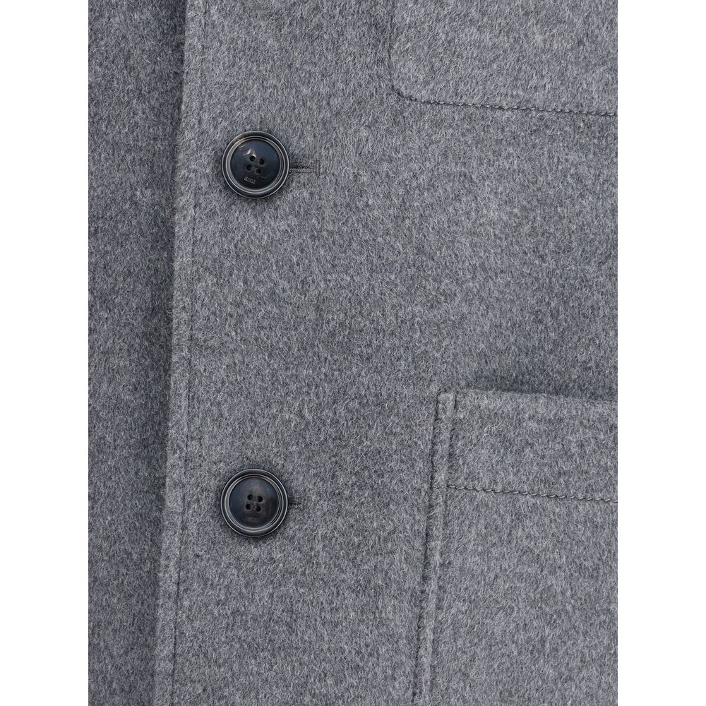 Close-up of Ami Paris Gray Wool Coat with button details and patch pocket.