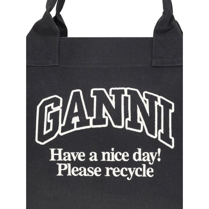 Ganni Black Cotton Shoulder Bag with GANNI logo and eco-friendly message on canvas, ideal for versatile and spacious carrying needs.