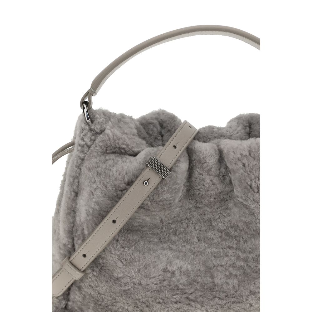 Brunello Cucinelli Gray Fur Shoulder Bag with soft shearling and leather strap, featuring drawstring closure and nickel-free metal details.