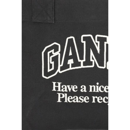 Ganni Black Cotton Shoulder Bag with logo and "Have a nice day! Please recycle" message on black canvas.