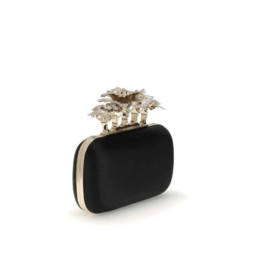 Alexander McQueen Black Silk Clutch Bag with crystal-encrusted carnation knuckle handle and gold chain.