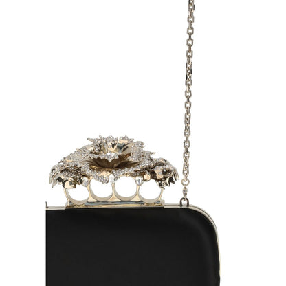 Alexander McQueen Black Silk Clutch Bag with crystal-encrusted carnation knuckle handle and gold-finish chain for elegant versatility.