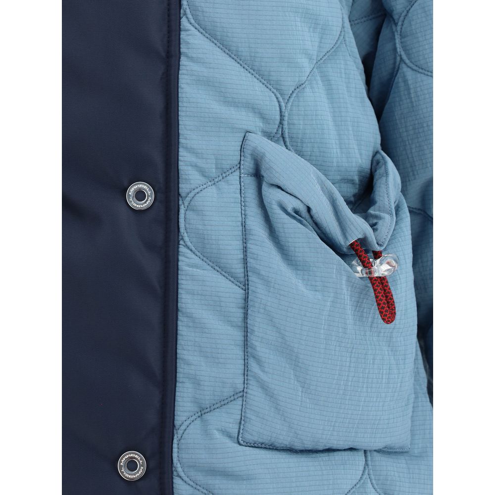 Close-up of MARBELL Light Blue Polyamide Coat featuring double-breasted closure with snap buttons and quilted design with contrasting shoulder detail.