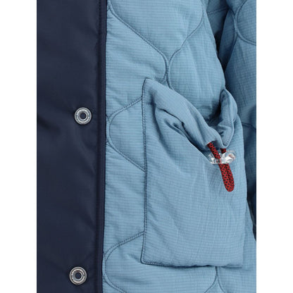 Close-up of MARBELL Light Blue Polyamide Coat featuring double-breasted closure with snap buttons and quilted design with contrasting shoulder detail.