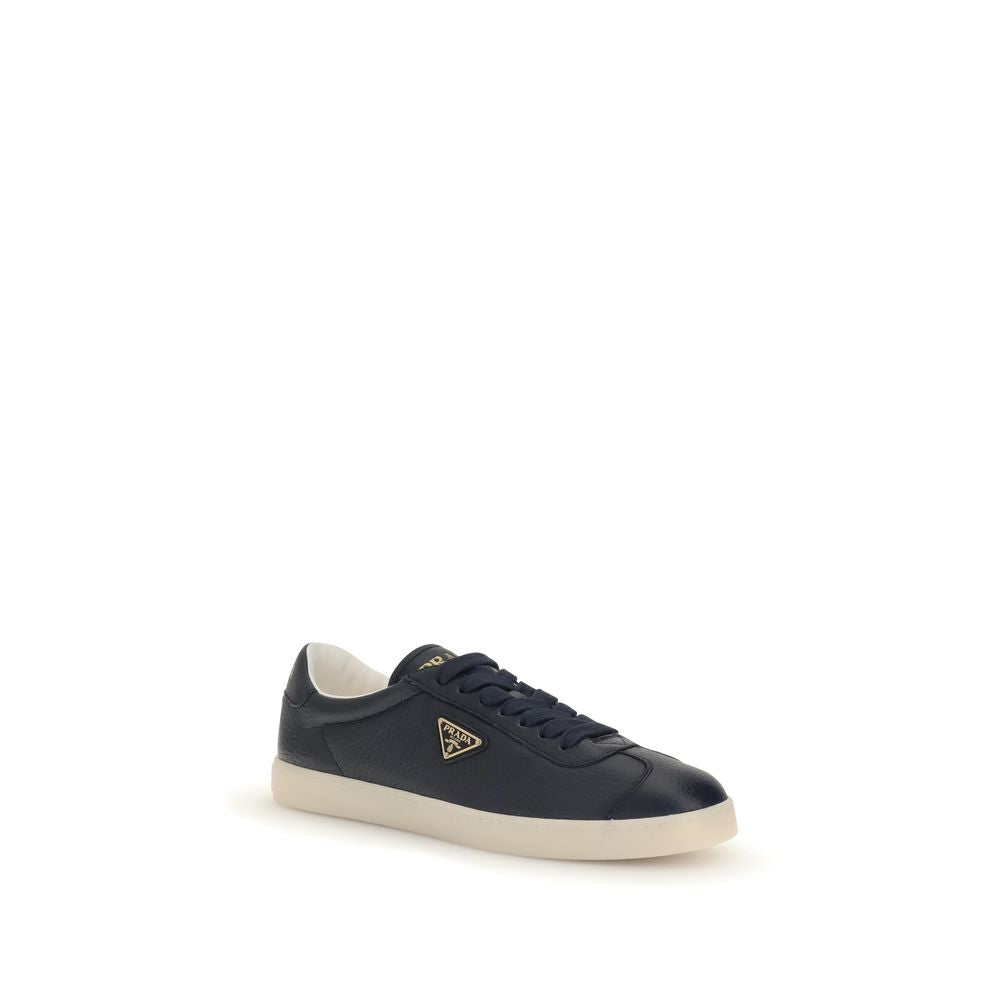 Prada Blue Calf Leather Bos Taurus Low Top Sneakers with embossed logo and lace-up closure.