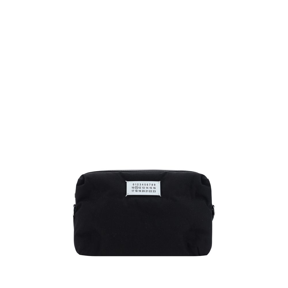 Margiela Black Nylon Shoulder Bag with calfskin leather inserts and logo label, adjustable strap, zipper closure, AW25 season.