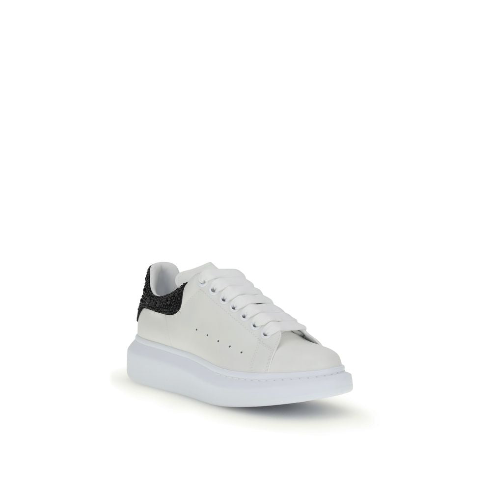 Alexander McQueen White Leather Chunky Sneakers with black crystal heel on white background
