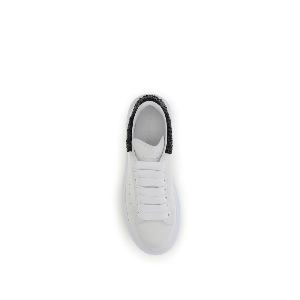 Top view of Alexander McQueen White Leather Chunky Sneakers with crystal-accented black heel and thick rubber sole.