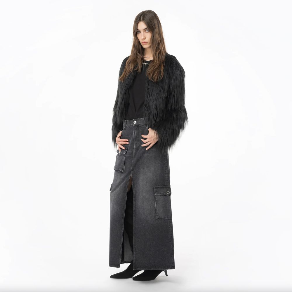 Model wearing PINKO Black Cotton Skirt, featuring zip closure, back and side pockets, styled with black faux fur jacket and heels.