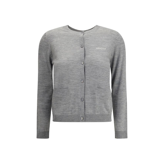 Gucci Gray Cashmere Cardigan with ribbed crew neck and front button closure, featuring iconic stitched signature and elegant patch pockets.