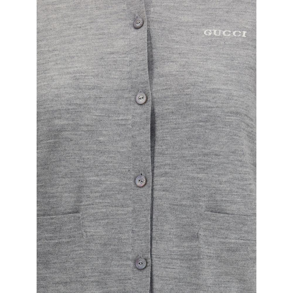 Gucci Gray Cashmere Cardigan with ribbed neck, button closure, and stitched logo detail.