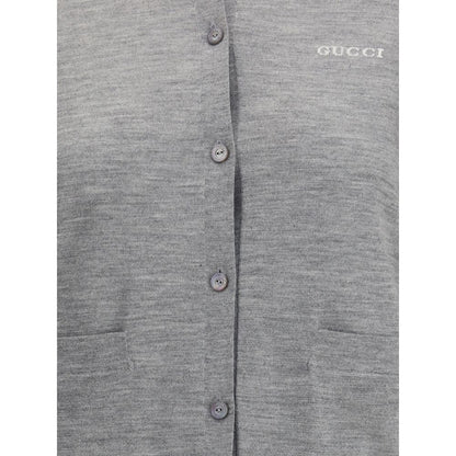 Gucci Gray Cashmere Cardigan with ribbed neck, button closure, and stitched logo detail.