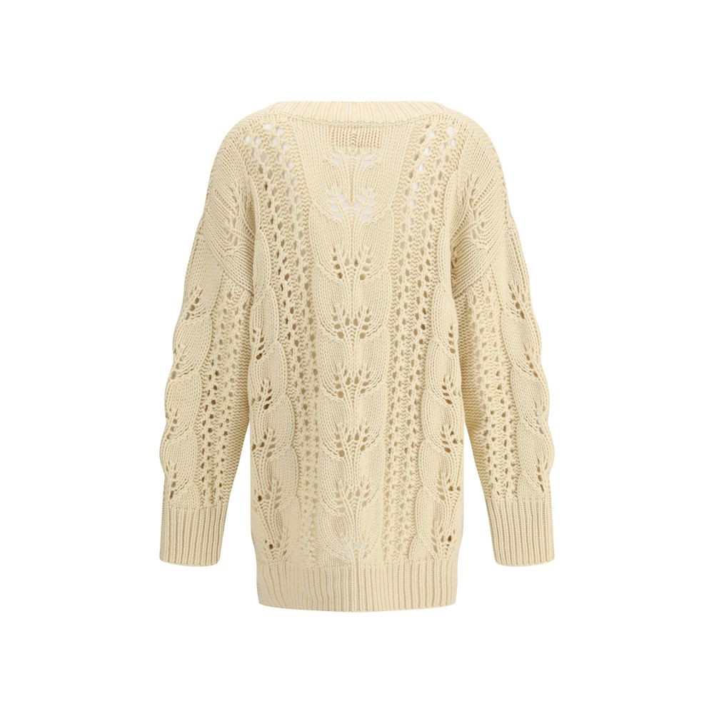 Ermanno Scervino Beige Cashmere Cardigan with perforated design and ribbed details, showcasing luxurious modern elegance and relaxed style.