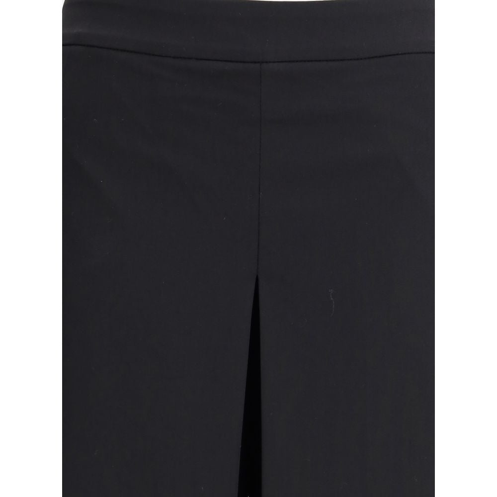 Di Stavnitser Black Polyester Casual Pants with sleek, flowing silhouette and invisible side zipper closure, perfect for AW25 collection.