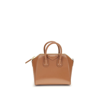 Givenchy Brown Calf Leather Bos Taurus Handbag with geometric design, shiny leather, and double-slider zipper closure.
