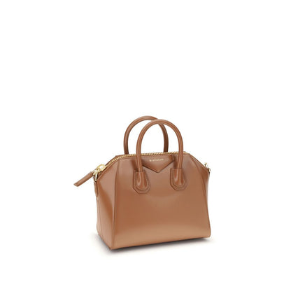 Givenchy Brown Calf Leather Bos Taurus Handbag with geometric design and top handles.