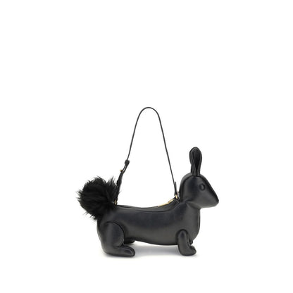 Thom Browne Black Calf Leather Bos Taurus Shoulder Bag shaped like a rabbit with fur tail and brass zipper closure.