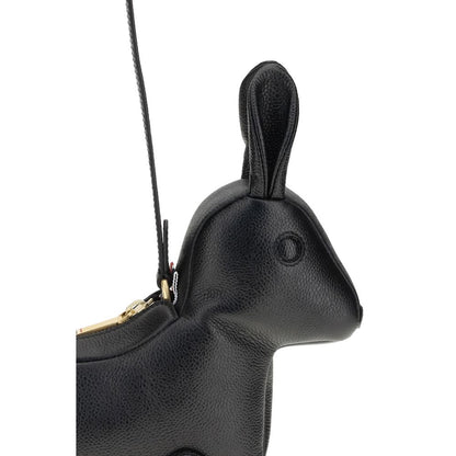 Thom Browne Black Calf Leather Bos Taurus Shoulder Bag with rabbit shape, brass zipper, and fur tail, AW25 collection.