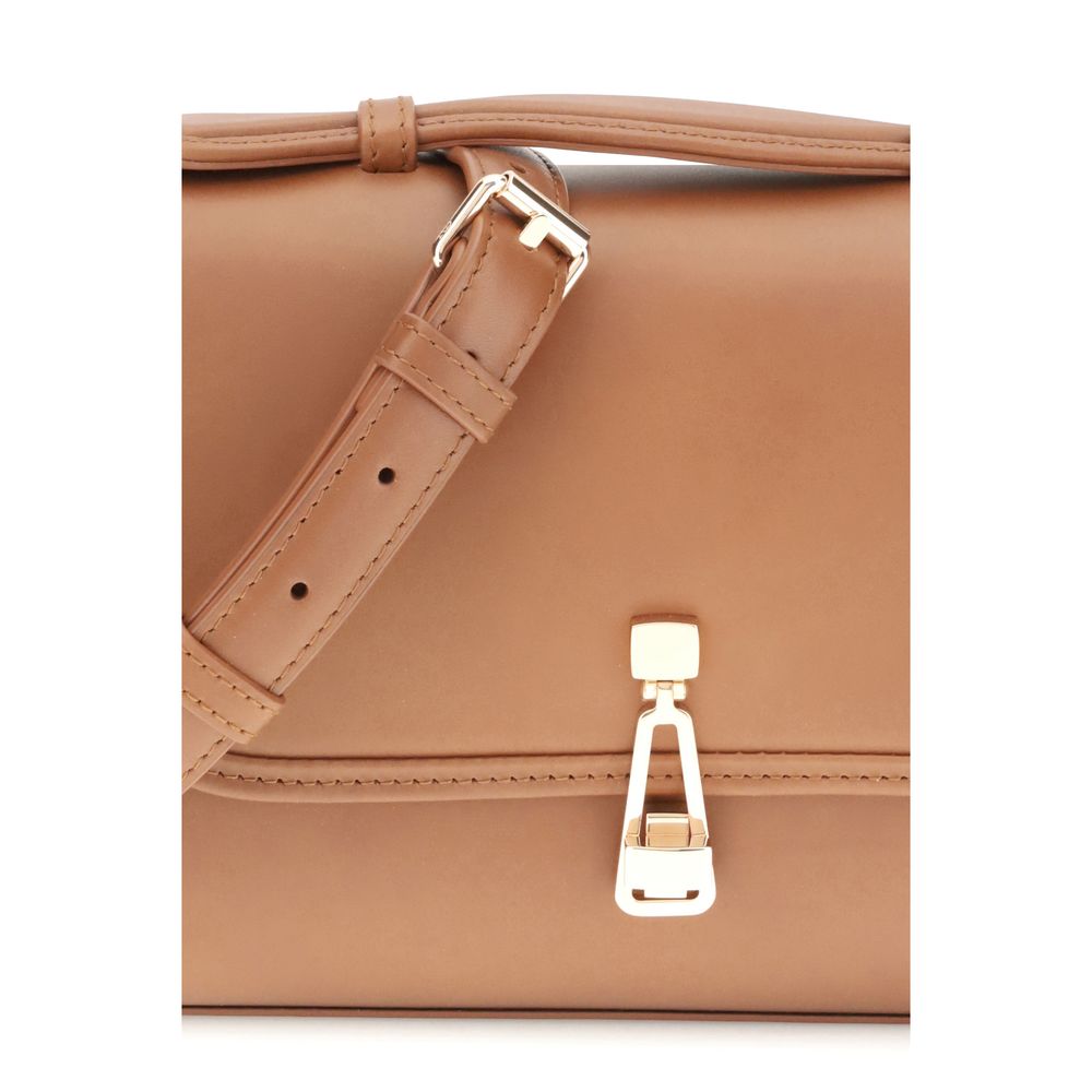 Close-up of Gabriela Hearst Brown Leather Shoulder Bag showcasing straps and metallic clasp detail.