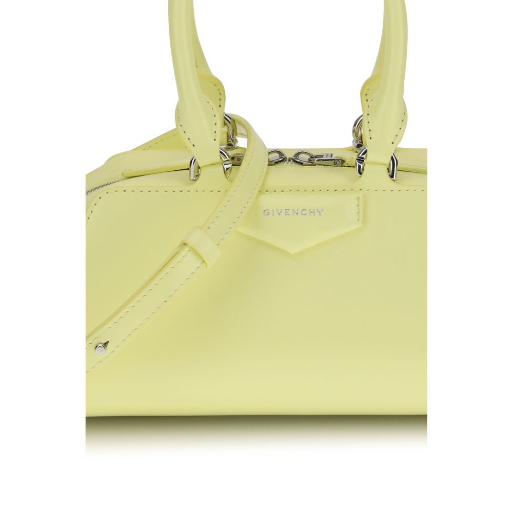 Givenchy Yellow Calf Leather Bos Taurus Handbag with structured design and embossed signature, featuring adjustable shoulder strap.
