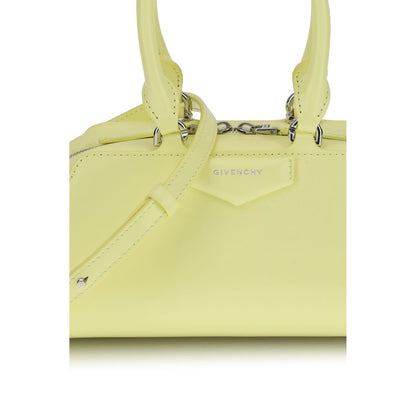 Givenchy Yellow Calf Leather Bos Taurus Handbag with structured design and embossed signature, featuring adjustable shoulder strap.