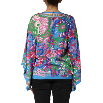 Dolce & Gabbana Multicolor Floral Print Silk Blouse Tunic Top featuring vibrant floral patterns in blue, pink, and green tones.