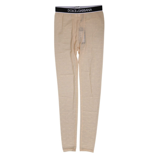 Dolce & Gabbana Beige Nylon Logo Lace Leggings Pants Underwear featuring a lace pattern and branded waistband.