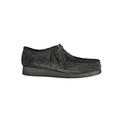 Clarks Black Leather Men Sneaker with suede finish and removable footbed, versatile for stylish streetwear.