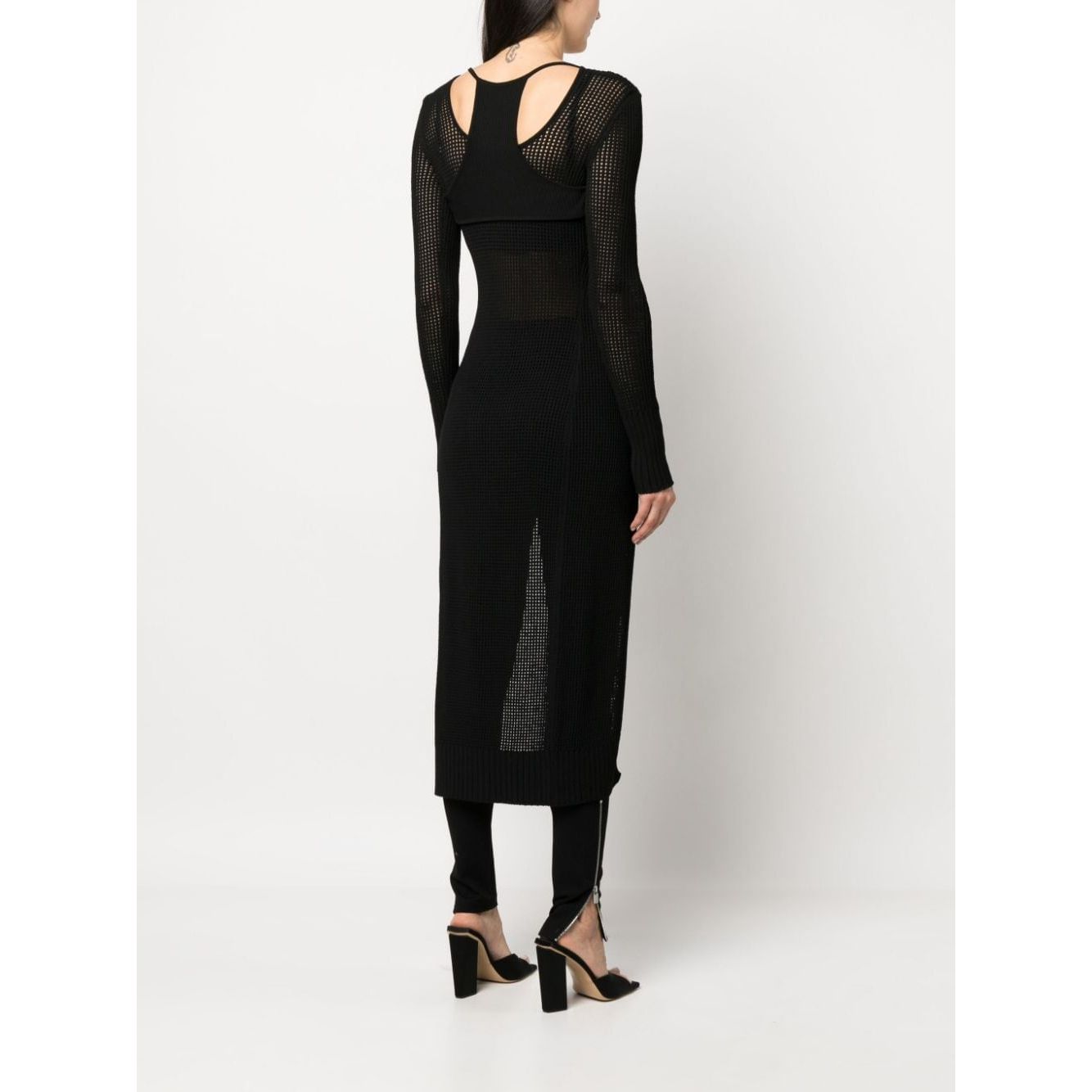 Back view of ANDREĀDAMO Andrea Adamo Sweaters Black semi-sheer racerback knitted cardigan with ribbed detailing and long sleeves.
