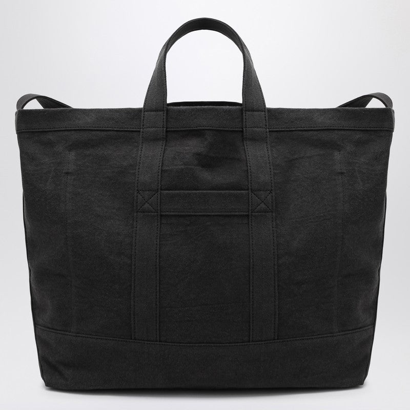 Front view with bag zipped and handles upright.