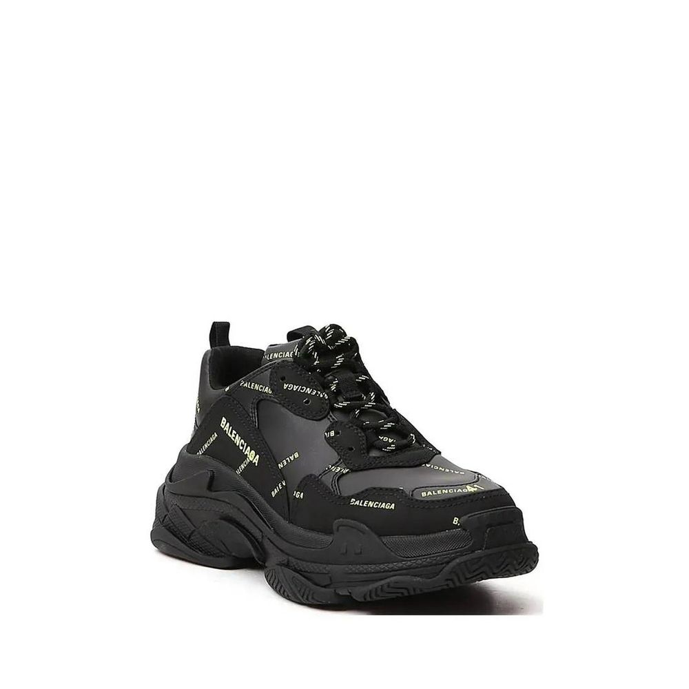 Balenciaga Black Calfskin Chunky Sneakers with logo detail, round toe, and lace-up closure. Made of calf leather, rubber sole. For men.