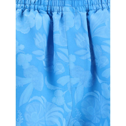 Balenciaga Blue Viscose Bermuda Shorts with floral pattern, elasticized waistband, and welt pockets for a bold summer look.