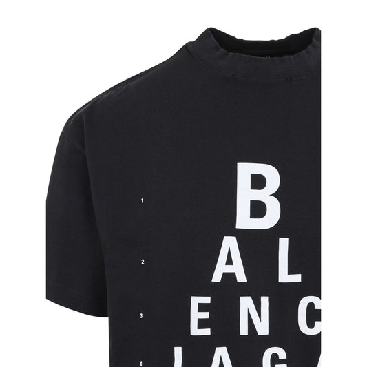 Close-up of Balenciaga T-shirts and Polos Black with white text design