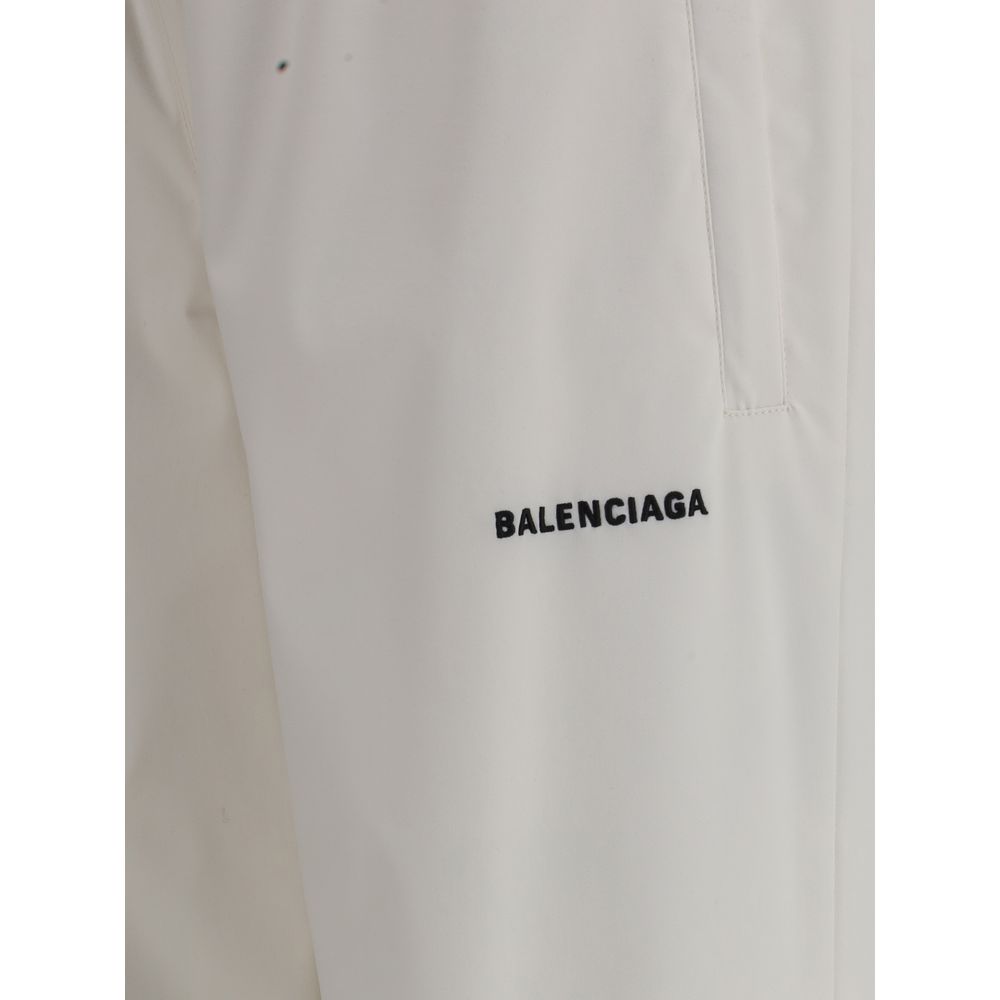 Close-up of Balenciaga White Polyester Joggers (Workout Pants) with logo detail.