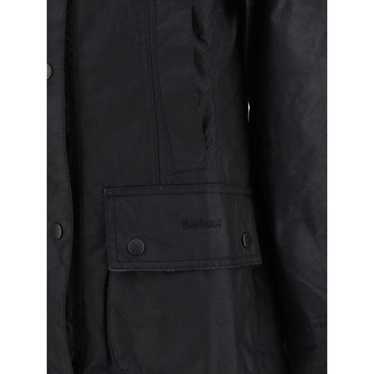 Barbour Black Cotton Coat with front zip, hidden press studs, ribbed collar, flap pockets, tartan lining, and monogram embroidery.