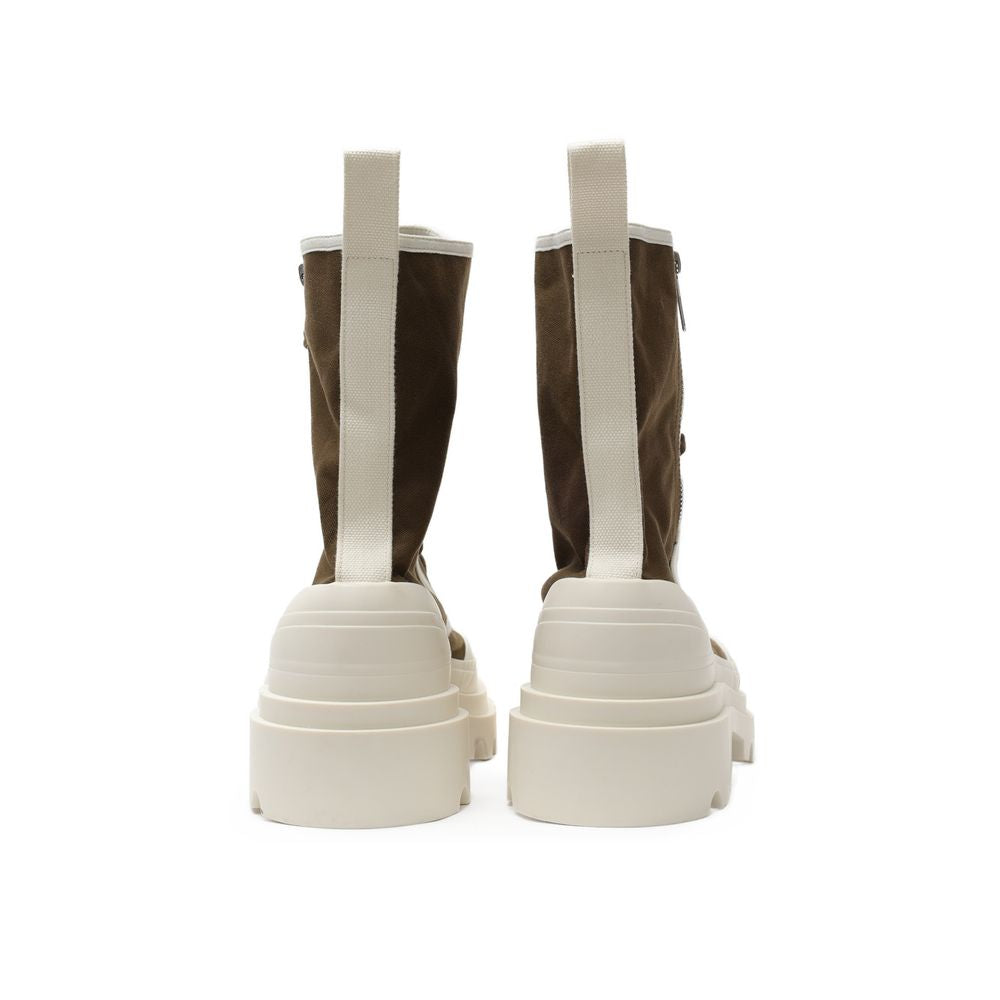 Rear view of Bottega Veneta Green Cotton Lace-Up Boots showcasing contrasting white fabric trim and maxi rubber outsole.