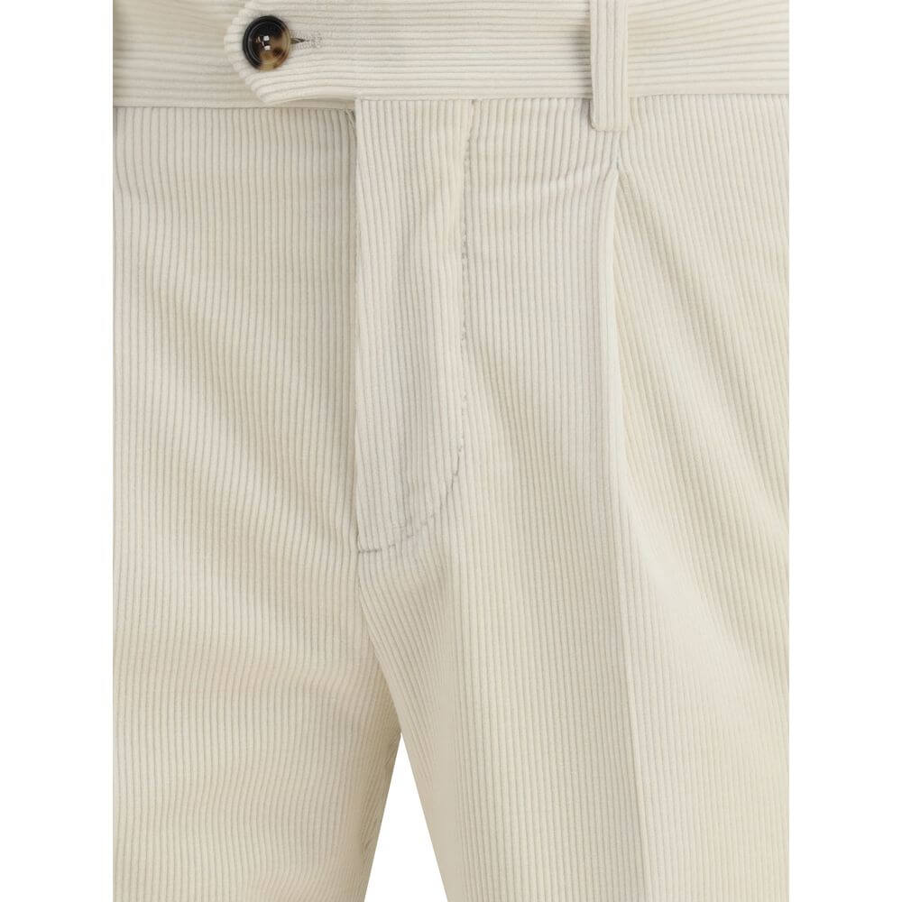 Close-up of Brunello Cucinelli Cream Cotton Two-Piece Suit trousers, showcasing elegant corduroy detail and button closure.