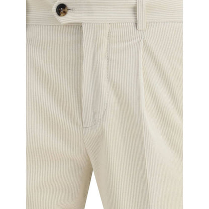Close-up of Brunello Cucinelli Cream Cotton Two-Piece Suit trousers, showcasing elegant corduroy detail and button closure.